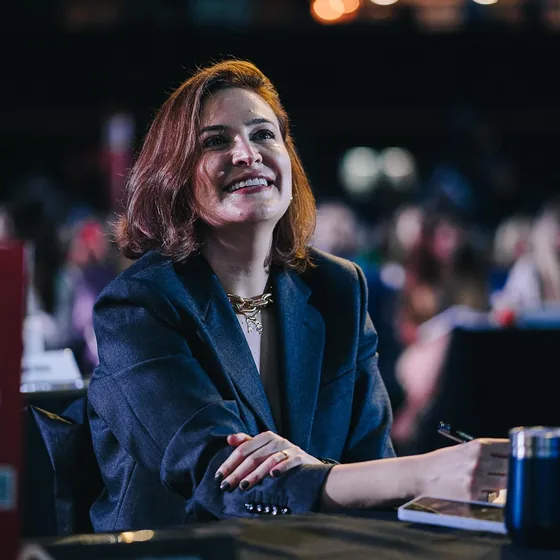 Dra. Juliana na plateia de um congresso